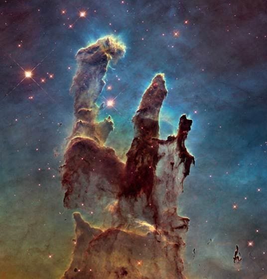 Pillars of Creation from Hubble Telescope. 5th January, 2015. NASA's Hubble Space Telescope has revisited the famous Pillars of Creation, revealing a sharper and wider view of the structures in this visible-light image. Astronomers combined several Hubble